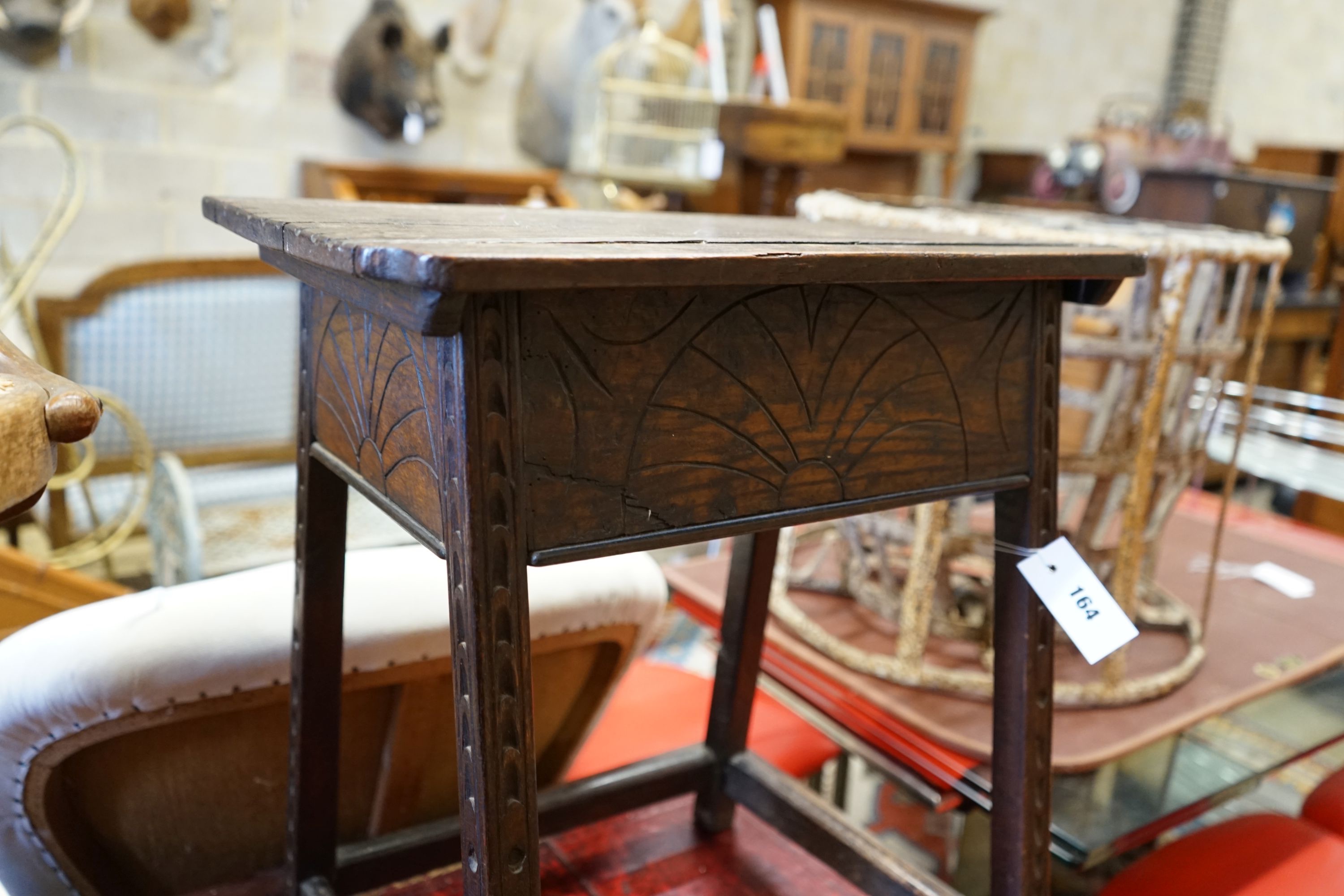 A 17th century style oak box on stand, width 48cm depth 33cm height 55cm